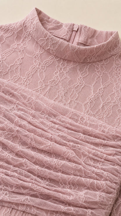 Close-up detail of mock neckline and ruched lace bodice