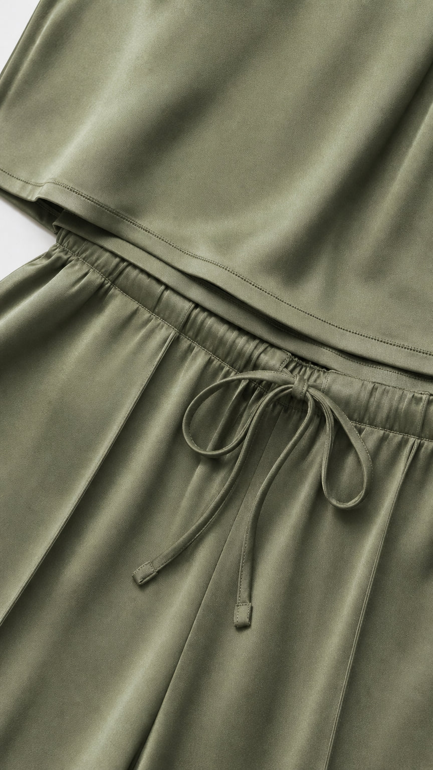 Close-up detail of Olive Green satin fabric, elastic waistband, and drawstring tie