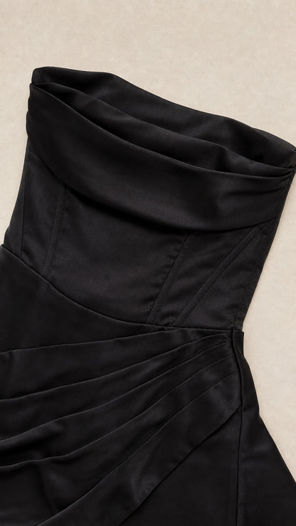 Close-up detail of structured corset seams and ruched satin foldover bust