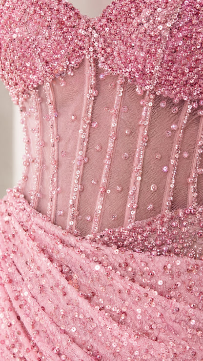 Close-up detail of embellished corset bodice and sequins