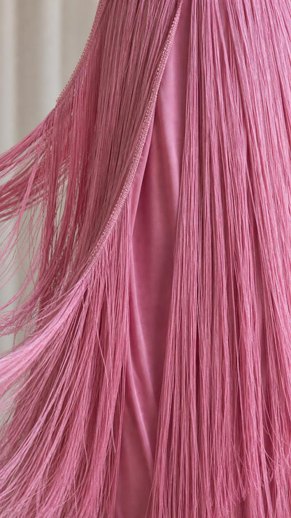 Close-up detail of fine pink fringe texture