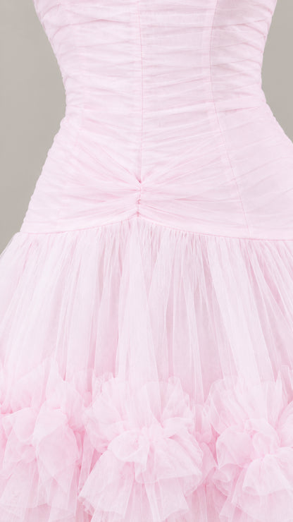 Close-up detail of ruched tulle bodice and ruffled skirt on Light Pink gown
