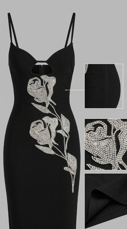 Detail photo of black bandage dress showing cutout neckline and crystal rose motif