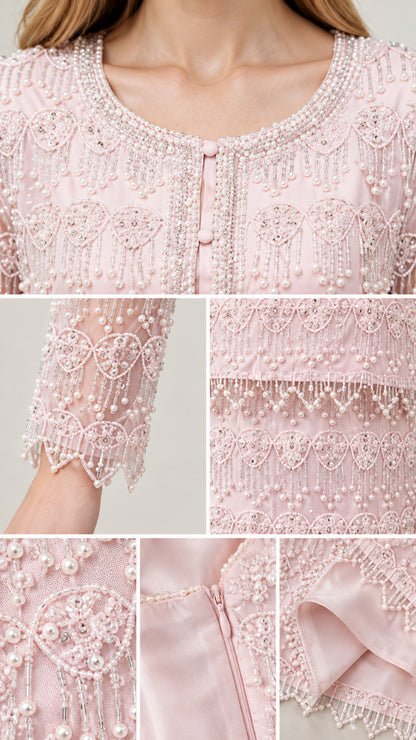 Close-up detail of faux pearl beading, neckline embroidery, cuffs, and lining