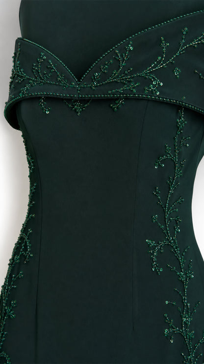 Close-up of beaded vine embroidery on neckline