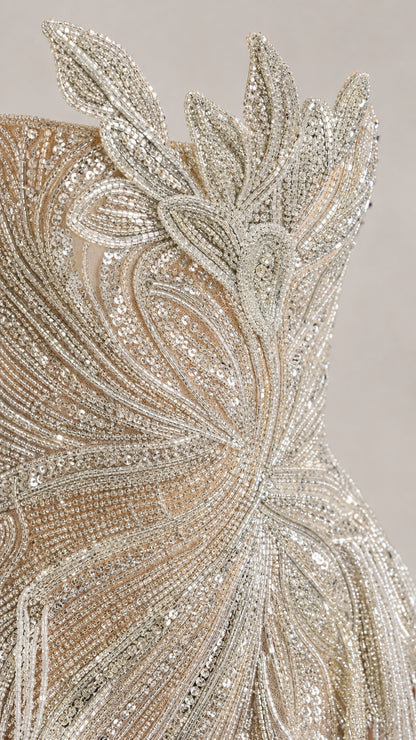 Close-up detail of silver sequin and bead floral embellishments