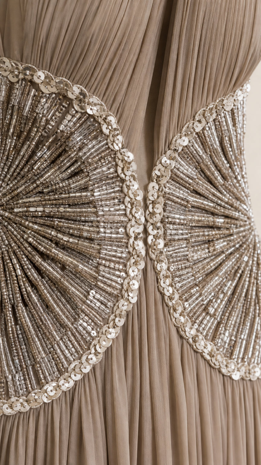 Close-up of intricate silver beadwork and sequin detailing on the waist