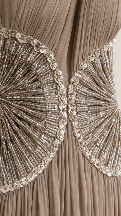 Close-up of intricate silver beadwork and sequin detailing on the waist
