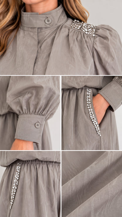 Close-up details of collar button, rhinestone shoulder trim, and pocket embellishments