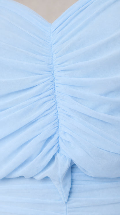 Close-up of ruched texture on baby blue dress fabric