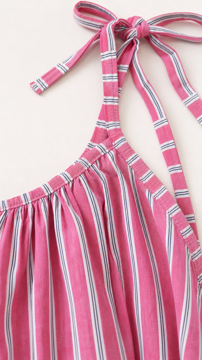 Close-up detail of self-tie shoulder straps and gathered neckline
