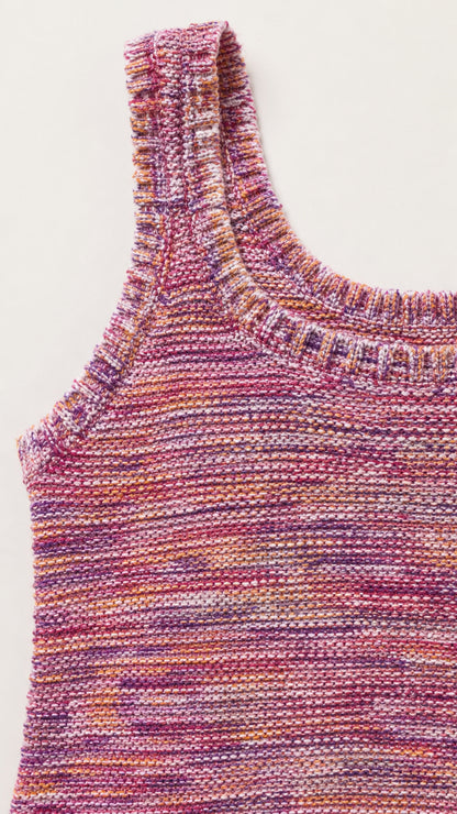 Close-up detail of neckline and textured knit pattern