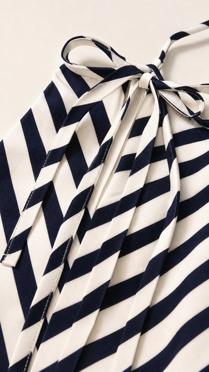 Close-up detail of halter neck tie and chevron stripe fabric