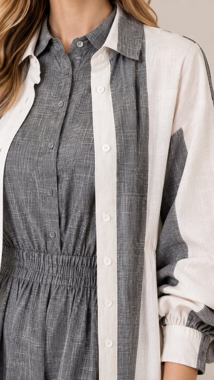Close-up detail of point collar, button placket, and textured linen-look fabric in charcoal grey