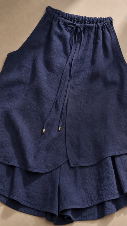 Close up of navy layered mini dress fabric and drawstring