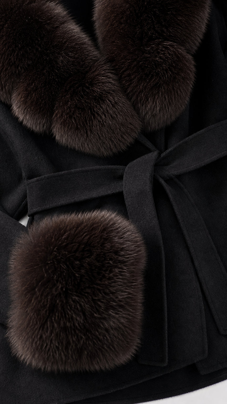 Close-up detail of plush brown-black faux fur collar, cuff, and self-tie belt