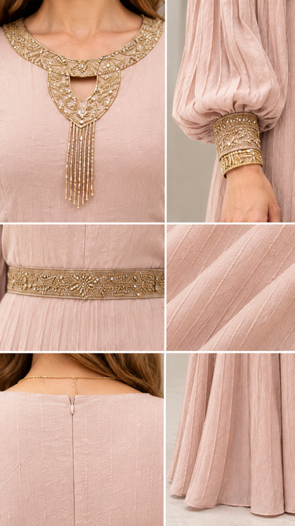 Close-up details of gold embroidery neckline, beaded waist trim, and textured pleated fabric