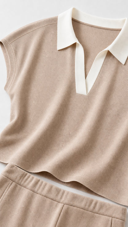 Close-up of beige knit polo collar and fabric texture