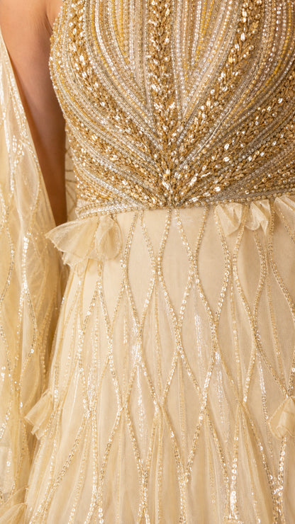 Close-up detail of the beaded bodice and sequin geometric skirt pattern