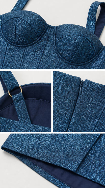 Close-up details of bodice, straps, zipper, and hem of blue shimmer midi dress