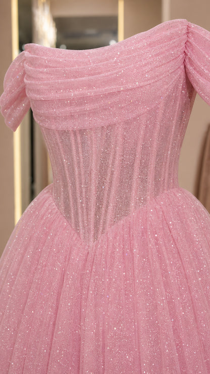Close up of draped off-shoulder sleeve and bodice structure