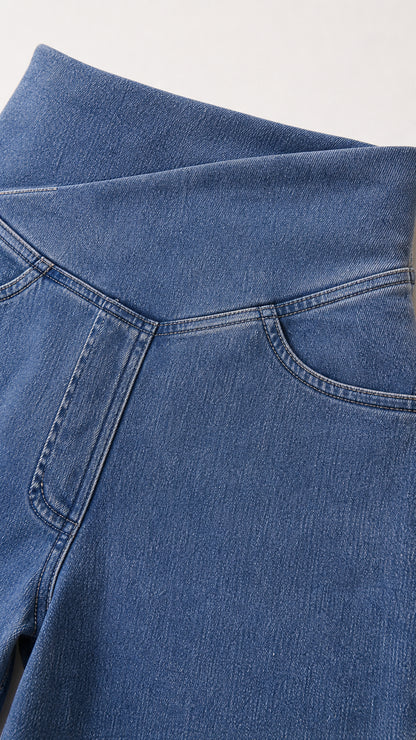 Close-up of the crossover high-waisted denim detail