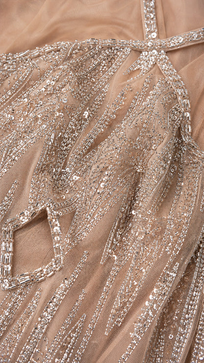 Close-up detail of sequin and bead embroidery texture
