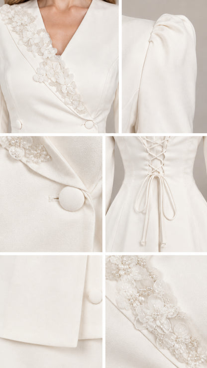 Close-up details of lace lapel beadwork, covered buttons, corset tie, and hem lace