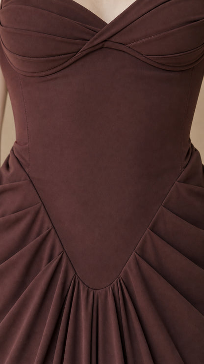 Close-up detail of sweetheart neckline and gathered basque waist stitching on chocolate brown gown