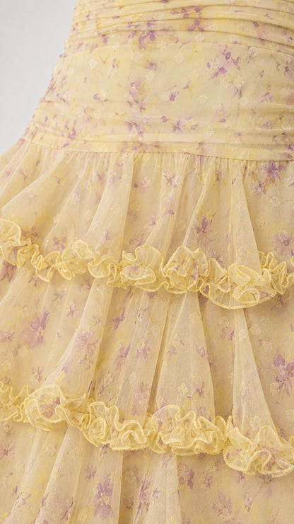 Close-up of yellow floral tiered ruffle fabric