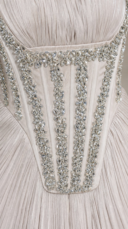 Close-up detail of sparkling crystal rhinestone embellishments on corset bodice
