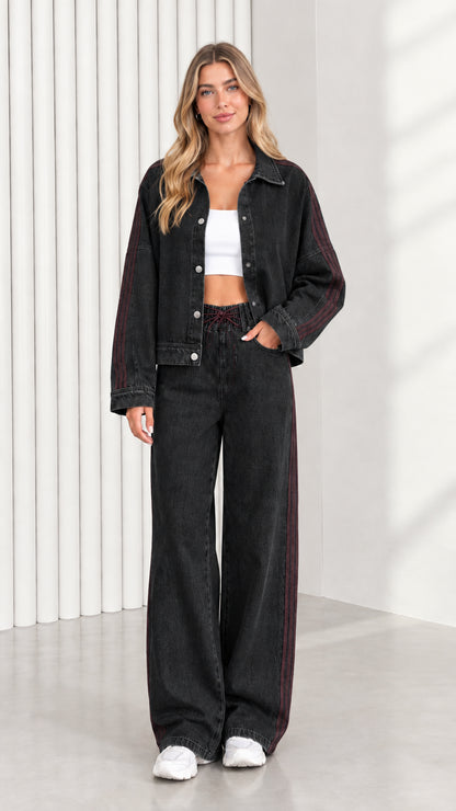 Model wearing Washed Black denim jacket and wide leg pants set with side tape