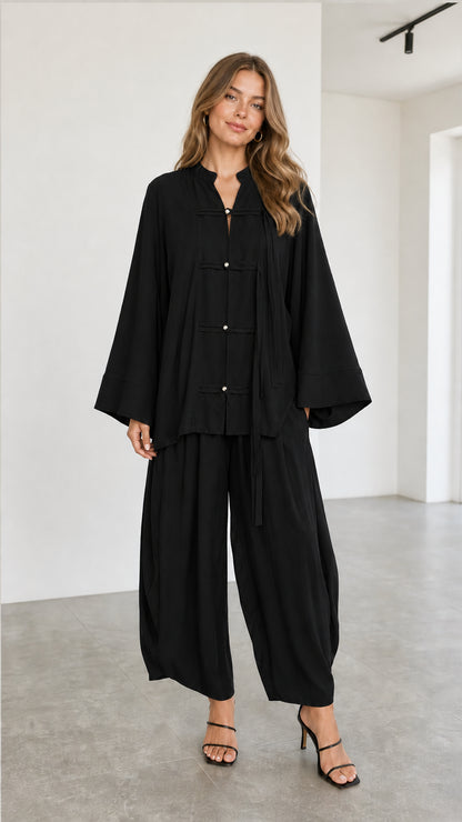 Women's black two-piece mandarin collar tunic top and lantern pants set