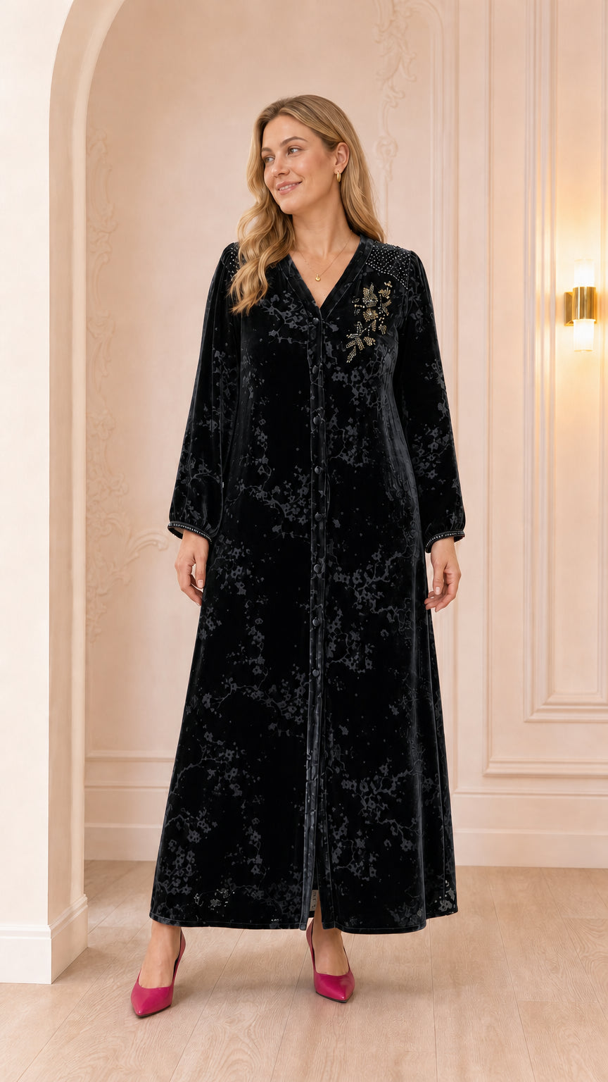 Full-length view of black floral beaded velvet maxi dress