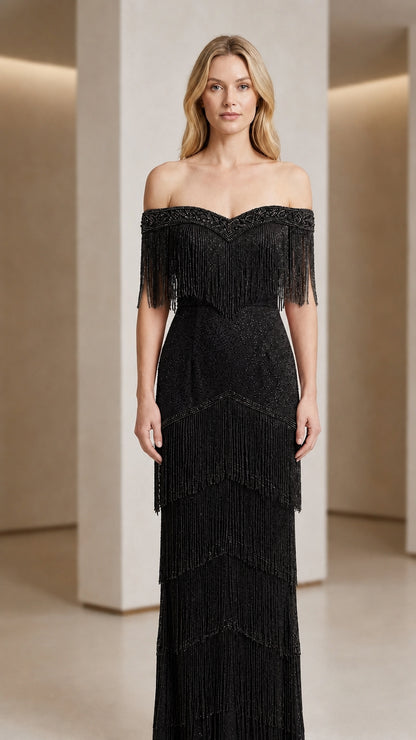 Front view of woman wearing black off-shoulder beaded fringe evening gown