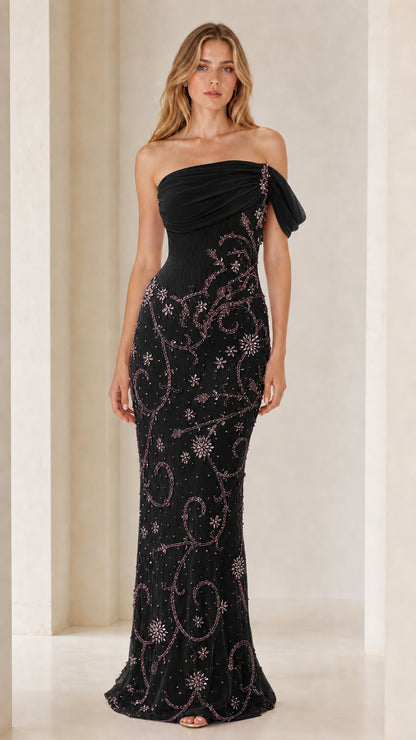 Front view of model wearing black one-shoulder beaded evening gown