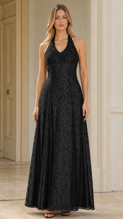 Model wearing black halter neck embroidered A-line formal gown