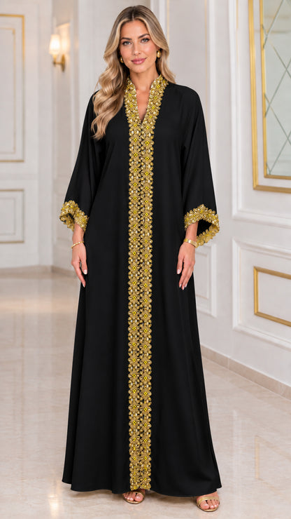 Front view of black kaftan maxi dress with gold embroidered center trim