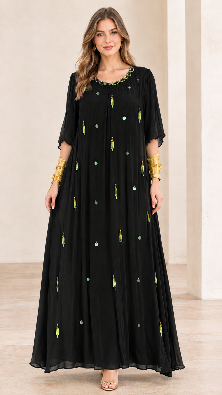 Full-length front view of black embellished pleated chiffon maxi dress