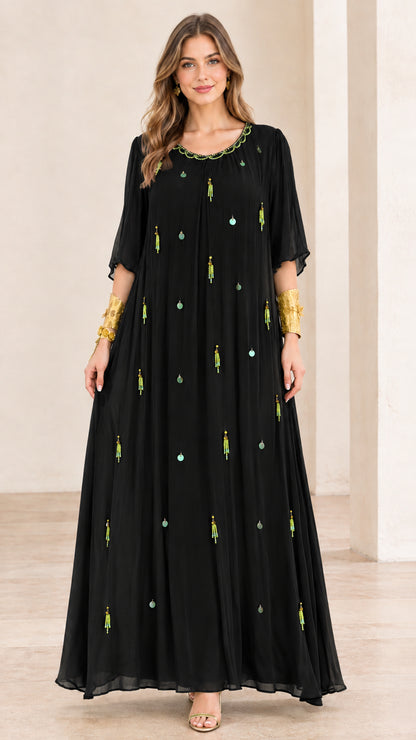 Full-length front view of black embellished pleated chiffon maxi dress