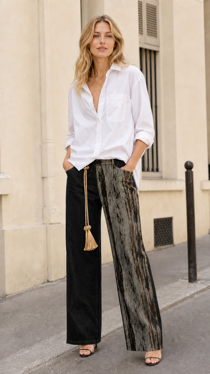 Full front view of model wearing black and grey contrast spliced wide leg jeans