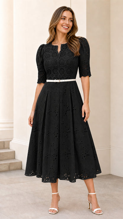 Front full view of black eyelet midi dress