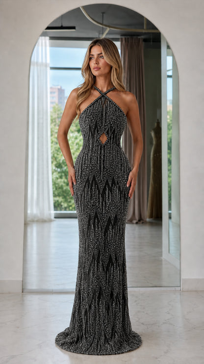 Front view of black sequined evening gown
