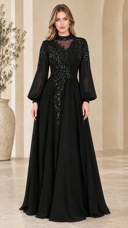 Front view of black sequin embroidered illusion long sleeve maxi gown