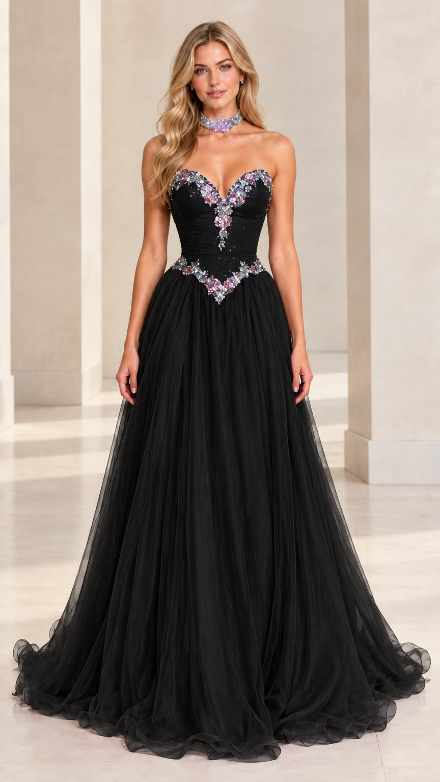 Front view of model wearing black beaded sweetheart tulle formal ballgown