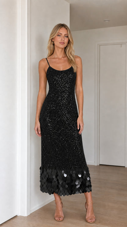 Model wearing black sequin midi dress