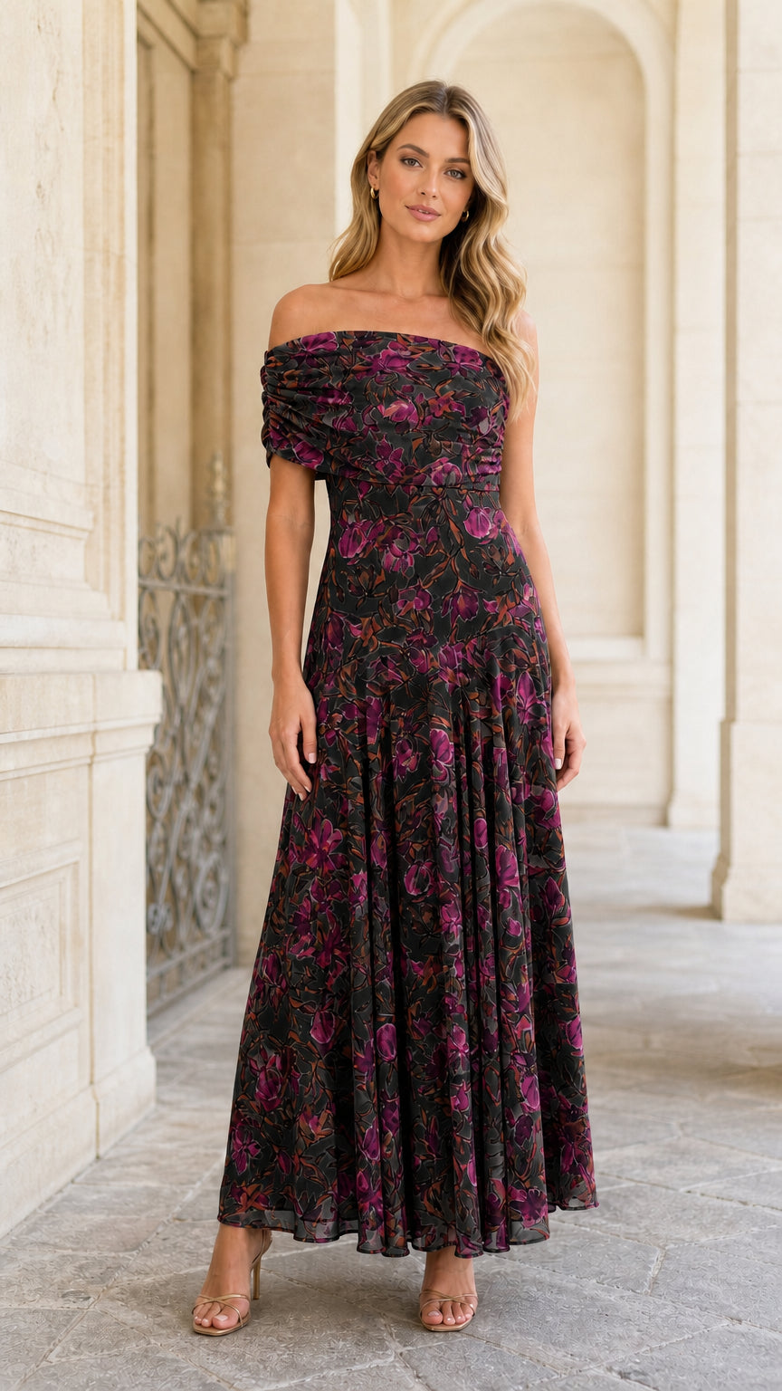 Model wearing black floral variant of the maxi dress