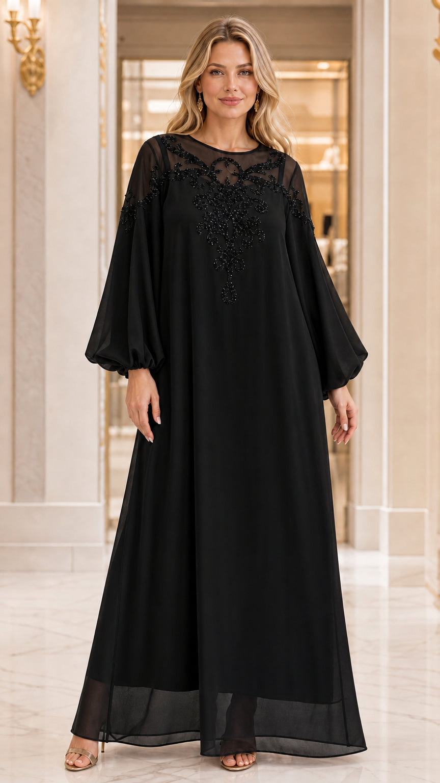Full-length front view of woman wearing Black beaded chiffon maxi gown