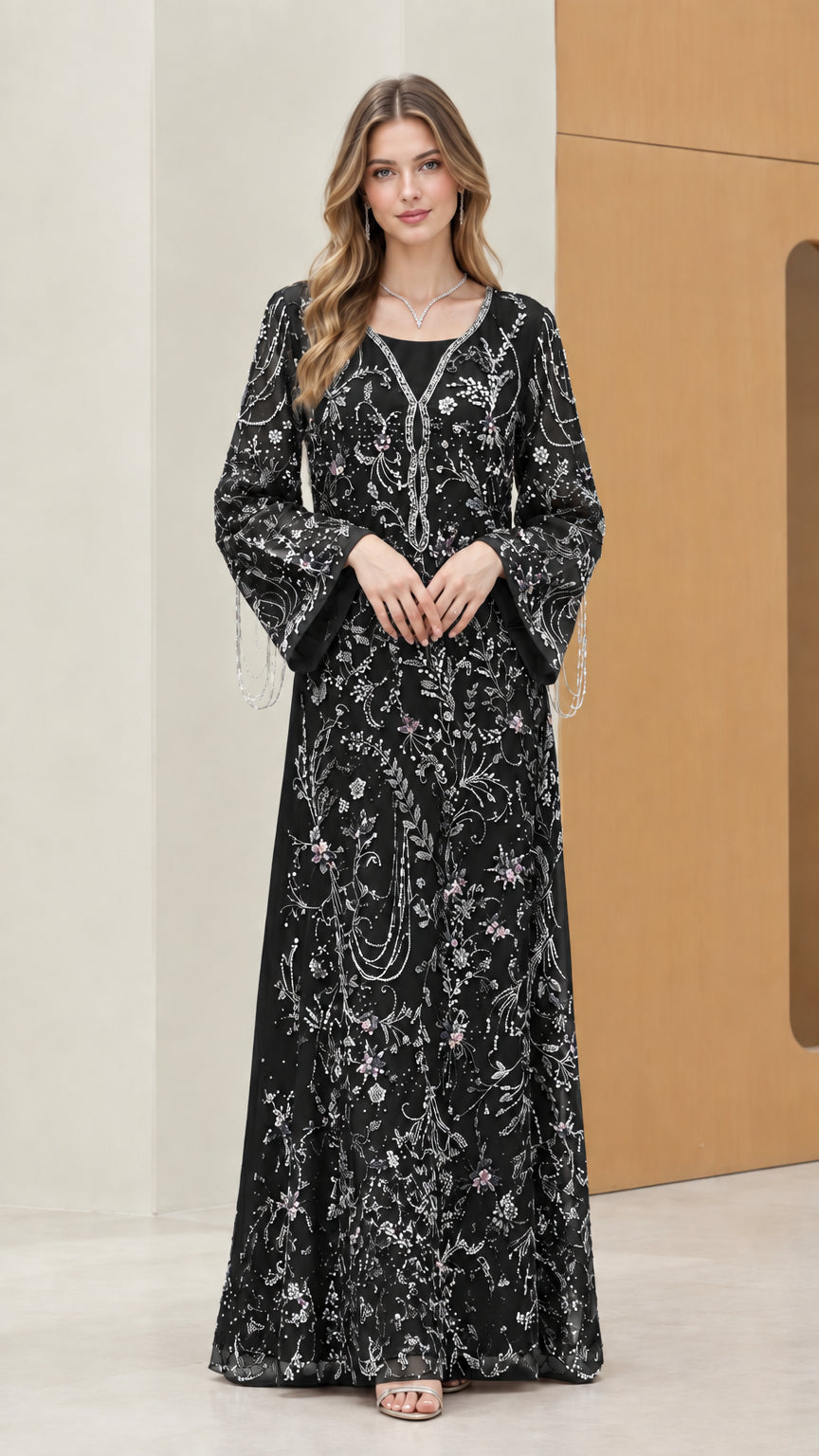Model wearing Black floral embroidered sequin evening maxi dress with beaded bell sleeves