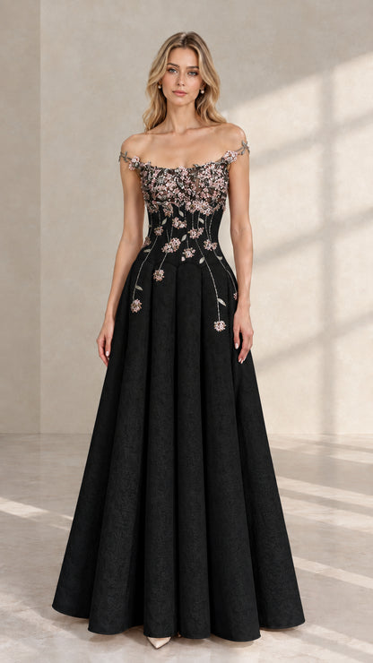 Front view of black off-the-shoulder A-line formal gown with floral embroidered bodice